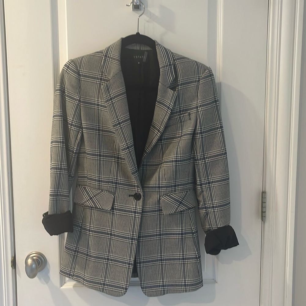 1.State blue and black blazer, in like new condition